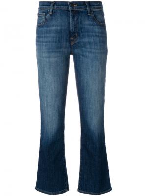 Расклешенные к низу джинсы с выцветшим эффектом J Brand. Цвет: синий