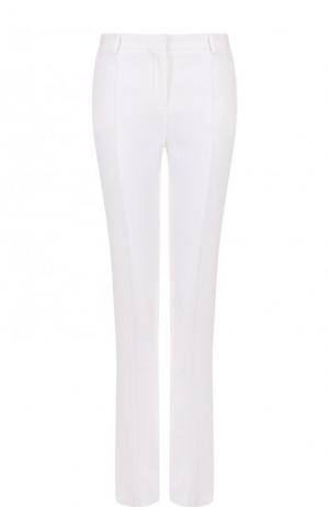 Однотонные расклешенные брюки со стрелками Versace. Цвет: белый