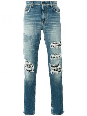 Рваные джинсы с заклепками Saint Laurent. Цвет: синий