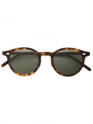 Круглые солнцезащитные очки Eyevan7285. Цвет: коричневый