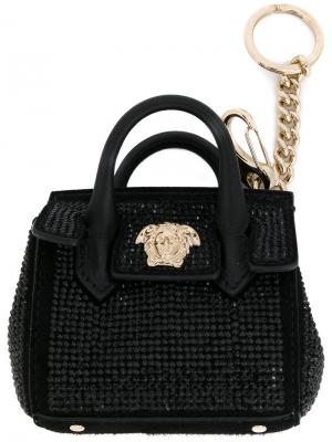Брелок в виде сумки с деталью Medusa Versace. Цвет: чёрный