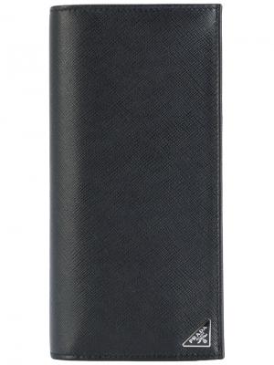 Вертикальный складной кошелек Prada. Цвет: чёрный