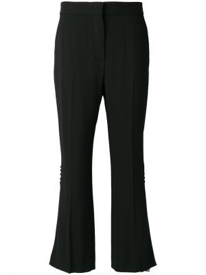 Расклешенные брюки с контрастными вставками MSGM. Цвет: чёрный