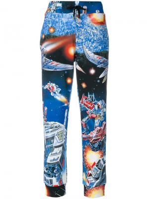 Спортивные брюки с космическим принтом Moschino. Цвет: многоцветный