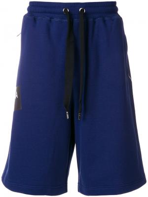 Спортивные шорты с логотипом Dolce & Gabbana. Цвет: синий