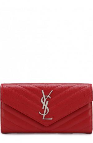 Кожаное портмоне с клапаном и логотипом бренда Saint Laurent. Цвет: красный