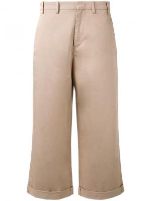 Укороченные расклешенные брюки Nº21. Цвет: телесный