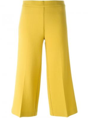 Укороченные расклешенные брюки P.A.R.O.S.H.. Цвет: жёлтый и оранжевый