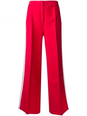 Расклешенные брюки с полосками по бокам Fendi. Цвет: красный