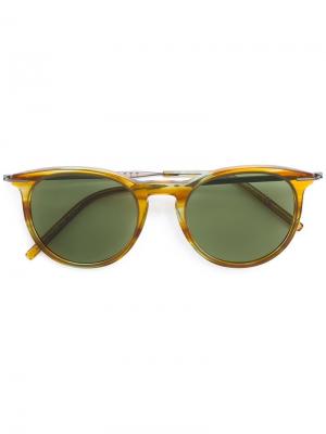 Солнцезащитные очки в круглой черепаховой оправе Tomas Maier Eyewear. Цвет: телесный