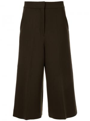 Укороченные брюки Cyclas. Цвет: коричневый