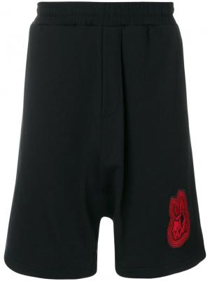 Спортивные шорты с заниженным шаговым швом McQ Alexander McQueen. Цвет: чёрный
