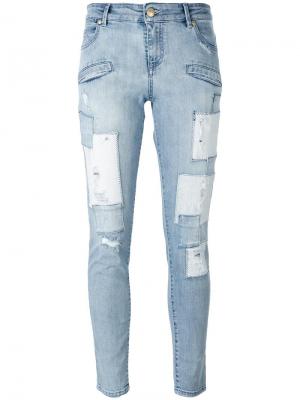 Рваные джинсы кроя скинни Pierre Balmain. Цвет: синий