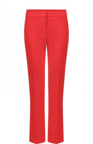 Однотонные укороченные брюки со стрелками Emporio Armani. Цвет: красный